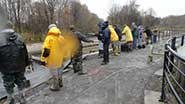 Photo of volunteers running pumps