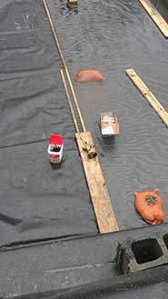 Photo of sealing liner to aqueduct